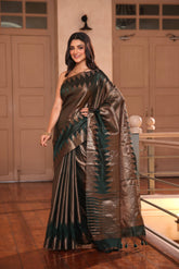 KAVVYA SOFT & LIGHT WEIGHT BOTTLE GREEN HANDLOOM SAREE WITH ALLOVER GOLDEN ZARI WEAVING ,BIG TEMPLE BORDER AND PALLU COMES WITH SAME COLOUR HEAVY BLOUSE