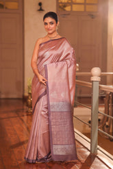 KAVVYA SOFT & LIGHT WEIGHT PINK SILK SAREE WITH BEAUTIFUL GOLDEN AND SILVER ZARI WEAVING ABSTRACK MOTIFS ALL OVER THE SAREE WITH CONTRAST PURPLE BORDER AND PALLU COMES WITH PURPLE COLOUR BLOUSE