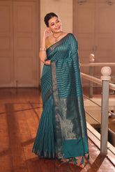 KAVVYA SOFT & LIGHT WEIGHT BLUE HANDLOOM WEAVED TUSSAR SAREE WITH GREY ZARI STRIPES ALLOVER THE SAREE COMES WITH SAME COLOUR BLOUSE