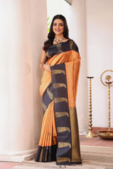KAVVYA SOFT & LIGHT WEIGHT ORANGE SILK SAREE FITH FINE GOLDEN ZARI WEAVING ALLOVER WITH CONTRAST BLACK BORDER AND PALLU HIGHLIGHTED WITH BEAUTIFUL MOTIFS.