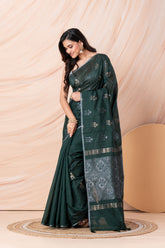 KAVVYA SOFT & LIGHT WEIGHT DARK GREEN HANDLOOM WEAVED TUSSAR SAREE WITH BEAUTIFUL MOTIF ALLOVER THE SAREE IN SILVER AND GOLDEN ZARI COMES WITH SAME COLOUR BLOUSE