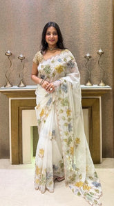 Elegant white organza saree with floral sequence work