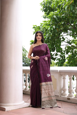 KAVVYA SOFT & LIGHT WEIGHT WINE HANDLOON TUSSAR SAREE WITH SMALL FLORAL MOTIFS IN THE SAREE COMES WITH CONTRAST COLOUR BORDER AND BLOUSE