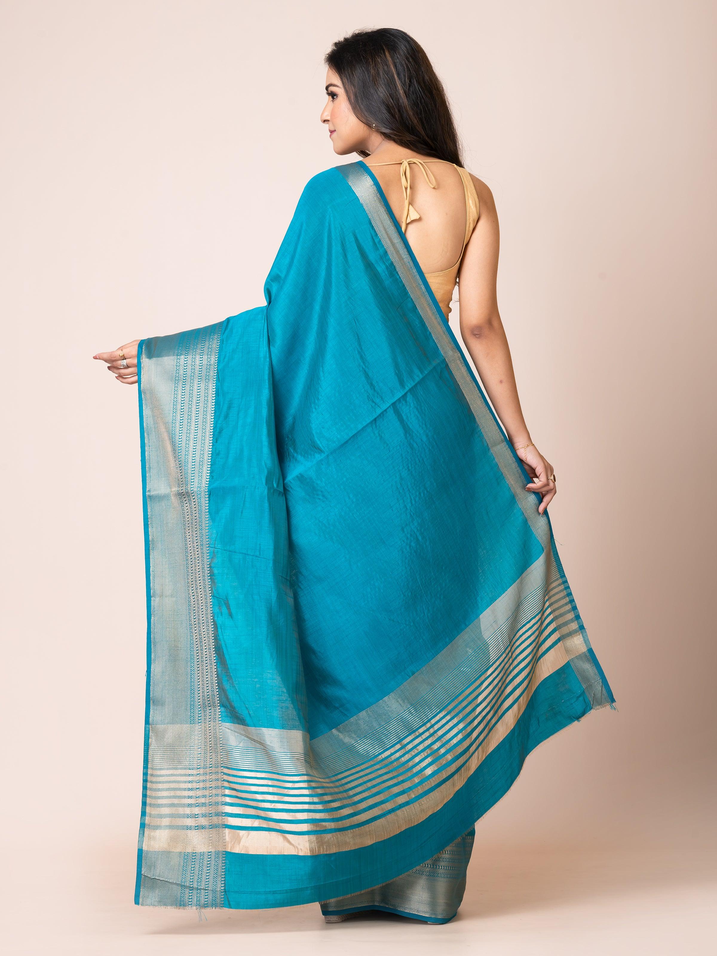 KAVVYA SOOTHING PEACOCK BLUE SOFT & LIGHT WEIGHT CELEBRITY THEME WEAVING SILK SAREE - KAVVYA 