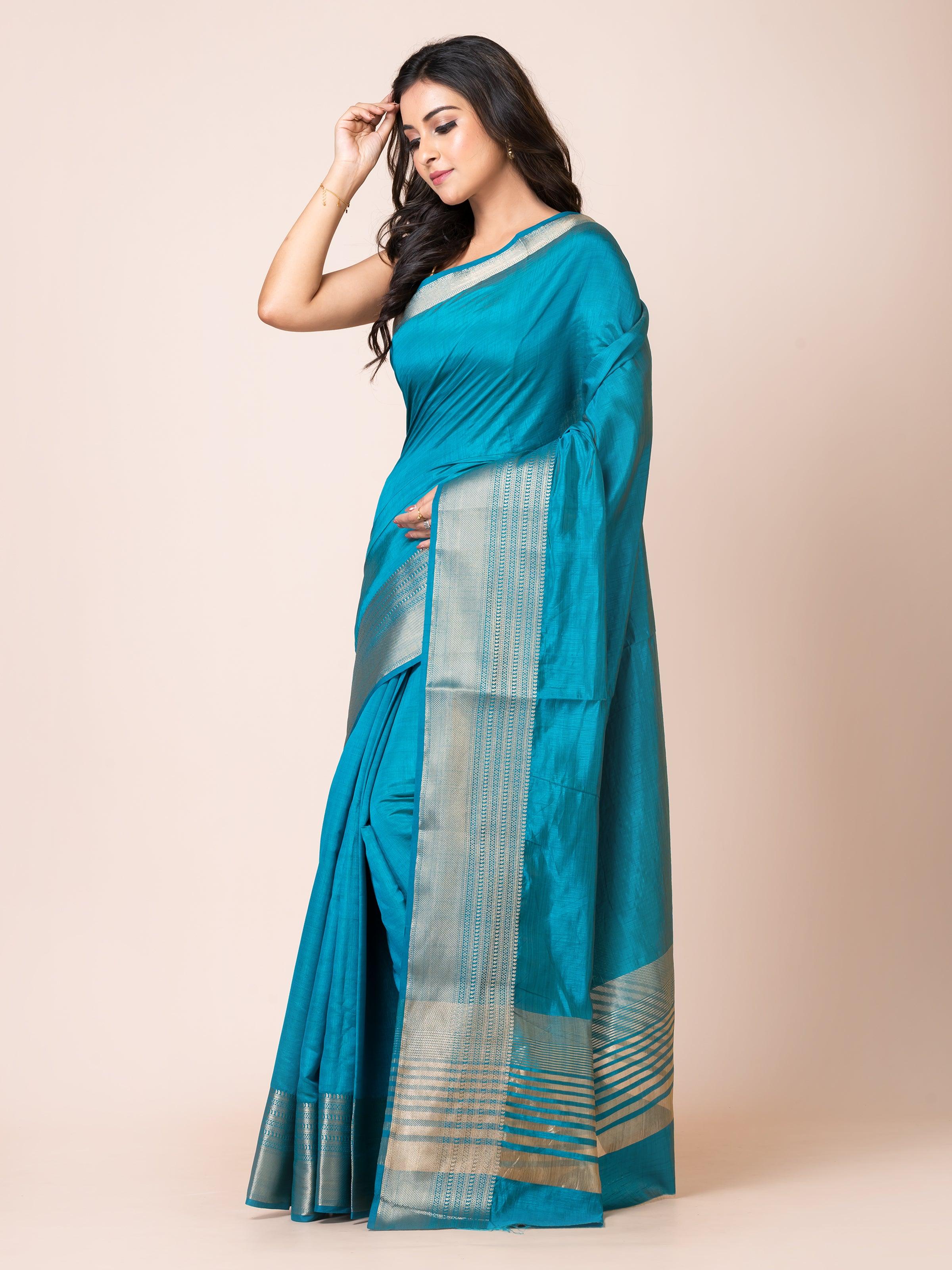 KAVVYA SOOTHING PEACOCK BLUE SOFT & LIGHT WEIGHT CELEBRITY THEME WEAVING SILK SAREE - KAVVYA 