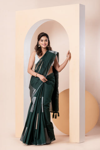 KAVVYA SOFT & LIGHT WEIGHT DARK GREEN HANDLOOM WEAVED TUSSAR SAREE WITH BEAUTIFUL GEMOTRIC FIGURES IN THE SAREE SAME COLOUR BLOUSE AND HEAVY PALLU