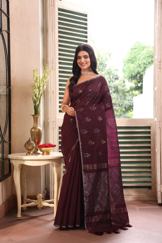 KAVVYA SOFT & LIGHT WEIGHT WINE HANDLOOM WEAVED TUSSAR SAREE WITH BEAUTIFUL MOTIF ALLOVER THE SAREE IN SILVER AND GOLDEN ZARI COMES WITH SAME COLOUR BLOUSE