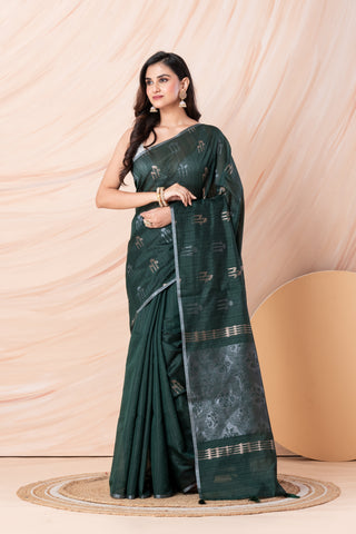 KAVVYA SOFT & LIGHT WEIGHT DARK GREEN HANDLOOM WEAVED TUSSAR SAREE WITH BEAUTIFUL MOTIF ALLOVER THE SAREE IN SILVER AND GOLDEN ZARI COMES WITH SAME COLOUR BLOUSE
