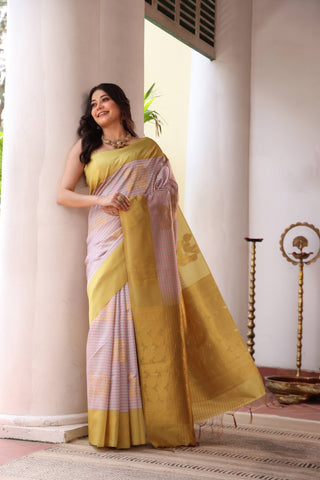 KAVVYA SOFT & LIGHT WEIGHT OFFWHITE SILK SAREE WITH CHECK WEAVED WITH COLOURFUL RESHAM AND BEAUTIFUL FLORAL MOTIFS ALL OVER THE SAREE WITH CONTRAST BORDER AND PALLU COMES WITH PALLU COLOURED CONTRAST BLOUSE