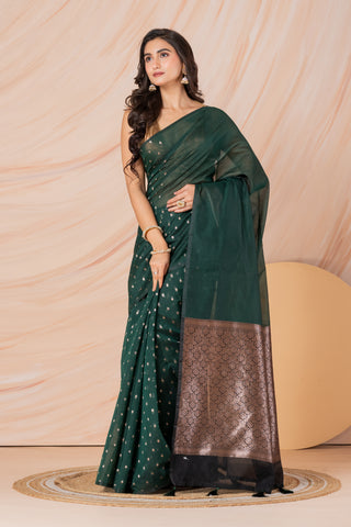 KAVVYA SOFT & LIGHT WEIGHT BOTTLE GREEN HANDLOOM  GOLDEN ZARI WEAVING SAREE IN TUSSAR FABRIC WITH BEAUTIFUL SMALL FLORAL MOTIFS ALLOVER THE SAREE COMES WITH BEAUTIFUL BIG MOTIF IN PALLU