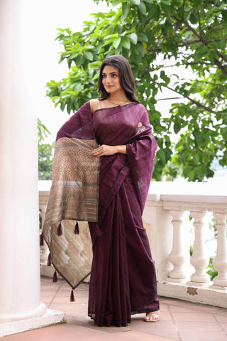 KAVVYA SOFT & LIGHT WEIGHT WINE HANDLOON TUSSAR SAREE WITH SMALL FLORAL MOTIFS IN THE SAREE COMES WITH CONTRAST COLOUR BORDER AND BLOUSE