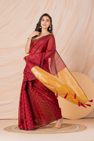KAVVYA SOFT & LIGHT WEIGHT RED HANDLOOM  GOLDEN ZARI WEAVING SAREE IN TUSSAR FABRIC WITH BEAUTIFUL SMALL FLORAL MOTIFS ALLOVER THE SAREE COMES WITH BEAUTIFUL BIG MOTIF IN PALLU