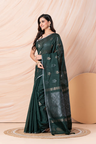 KAVVYA SOFT & LIGHT WEIGHT DARK GREEN HANDLOOM WEAVED TUSSAR SAREE WITH BEAUTIFUL MOTIF ALLOVER THE SAREE IN SILVER AND GOLDEN ZARI COMES WITH SAME COLOUR BLOUSE