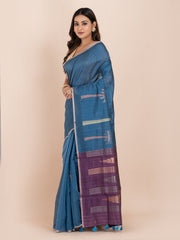 KAVVYA SOFT & LIGHT WEIGHT BLUE & RAW SILK BODY PLAIN WITH TREE MOTIFS ON THE BODY COMES WITH CONTRAST PURPLE PALLU WITH PURPLE COLOUR BLOUSE .