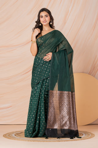 KAVVYA SOFT & LIGHT WEIGHT BOTTLE GREEN HANDLOOM  GOLDEN ZARI WEAVING SAREE IN TUSSAR FABRIC WITH BEAUTIFUL SMALL FLORAL MOTIFS ALLOVER THE SAREE COMES WITH BEAUTIFUL BIG MOTIF IN PALLU