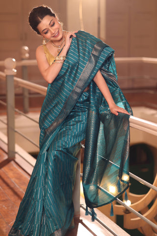 KAVVYA SOFT & LIGHT WEIGHT BLUE HANDLOOM WEAVED TUSSAR SAREE WITH GREY ZARI STRIPES ALLOVER THE SAREE COMES WITH SAME COLOUR BLOUSE