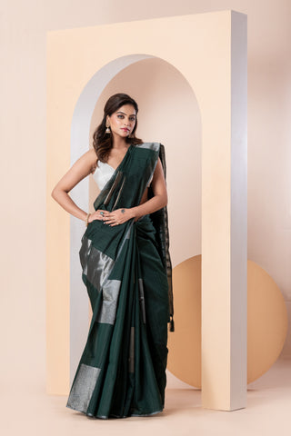 KAVVYA SOFT & LIGHT WEIGHT DARK GREEN HANDLOOM WEAVED TUSSAR SAREE WITH BEAUTIFUL GEMOTRIC FIGURES IN THE SAREE SAME COLOUR BLOUSE AND HEAVY PALLU