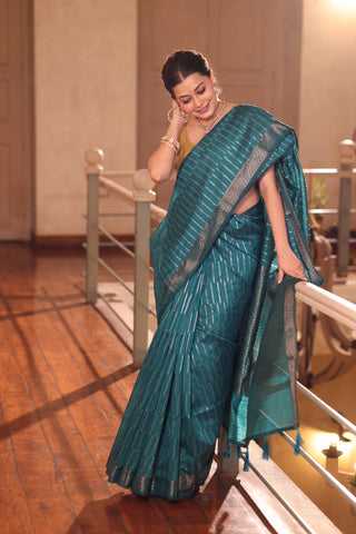 KAVVYA SOFT & LIGHT WEIGHT BLUE HANDLOOM WEAVED TUSSAR SAREE WITH GREY ZARI STRIPES ALLOVER THE SAREE COMES WITH SAME COLOUR BLOUSE