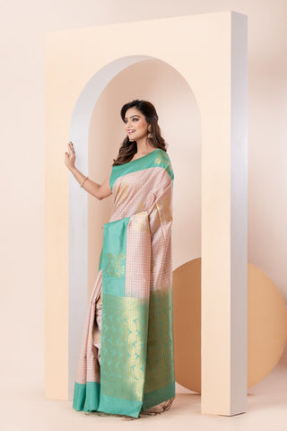 KAVVYA SOFT & LIGHT WEIGHT OFFWHITE SILK SAREE WITH CHECK WEAVED WITH COLOURFUL RESHAM AND BEAUTIFUL FLORAL MOTIFS ALL OVER THE SAREE WITH CONTRAST BORDER AND PALLU COMES WITH PALLU COLOURED CONTRAST BLOUSE
