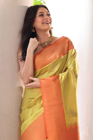 KAVVYA SOFT & LIGHT WEIGHT GREEN SILK SAREE WITH BEAUTIFUL BIRD MOTIFS COMES WITH CONTRAST ORANGE HEAVY WEAVING BORDER AND PALLU