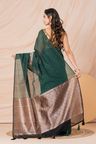 KAVVYA SOFT & LIGHT WEIGHT BOTTLE GREEN HANDLOOM  GOLDEN ZARI WEAVING SAREE IN TUSSAR FABRIC WITH BEAUTIFUL SMALL FLORAL MOTIFS ALLOVER THE SAREE COMES WITH BEAUTIFUL BIG MOTIF IN PALLU