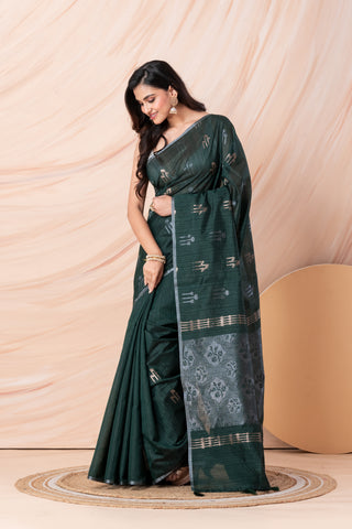 KAVVYA SOFT & LIGHT WEIGHT DARK GREEN HANDLOOM WEAVED TUSSAR SAREE WITH BEAUTIFUL MOTIF ALLOVER THE SAREE IN SILVER AND GOLDEN ZARI COMES WITH SAME COLOUR BLOUSE