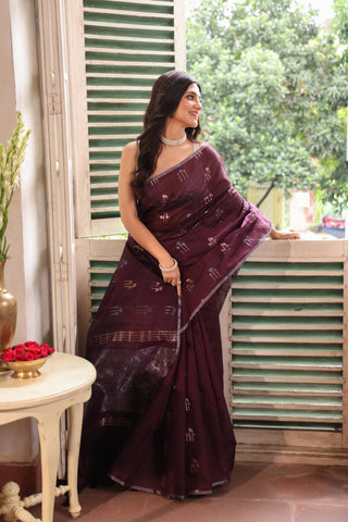 KAVVYA SOFT & LIGHT WEIGHT WINE HANDLOOM WEAVED TUSSAR SAREE WITH BEAUTIFUL MOTIF ALLOVER THE SAREE IN SILVER AND GOLDEN ZARI COMES WITH SAME COLOUR BLOUSE