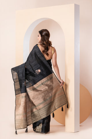 KAVVYA SOFT & LIGHT WEIGHT BLACK HANDLOON TUSSAR SAREE WITH SMALL FLORAL MOTIFS IN THE SAREE COMES WITH CONTRAST COLOUR BORDER AND BLOUSE