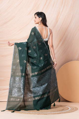KAVVYA SOFT & LIGHT WEIGHT DARK GREEN HANDLOOM WEAVED TUSSAR SAREE WITH BEAUTIFUL MOTIF ALLOVER THE SAREE IN SILVER AND GOLDEN ZARI COMES WITH SAME COLOUR BLOUSE