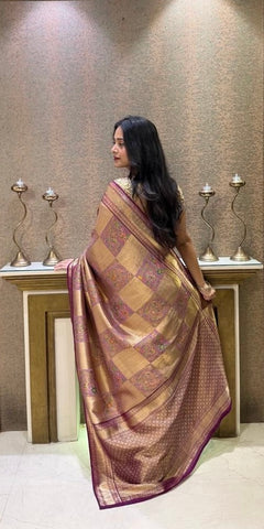 Elegant mauve silk saree with intricate floral motifs