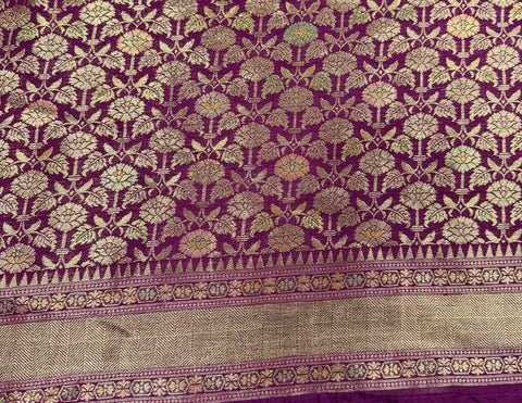 Elegant mauve silk saree with intricate floral motifs