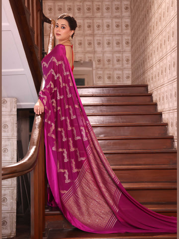 KAVVYA  WINE CREPE SAREE WITH ALL OVER GOLDEN ZARI WEAVING COMES WITH SATIN BORDER AND BEAUTIFUL ZARI WEAVED BLOUSE