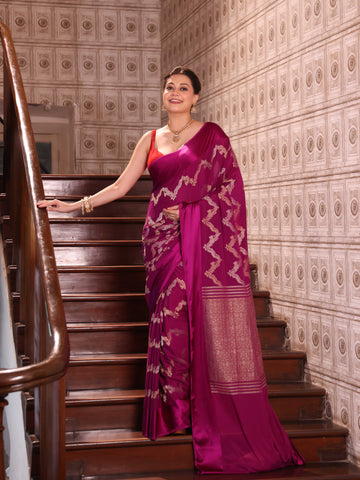 KAVVYA  WINE CREPE SAREE WITH ALL OVER GOLDEN ZARI WEAVING COMES WITH SATIN BORDER AND BEAUTIFUL ZARI WEAVED BLOUSE