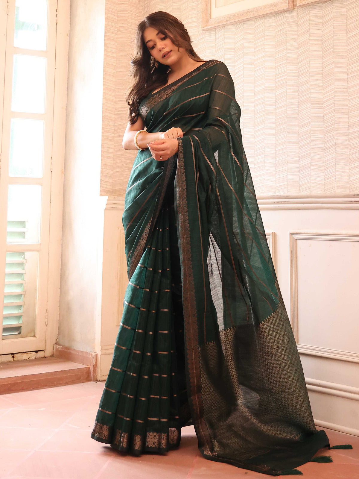 KAVVYA  BOTTLE GREEN HANDLOOM WEAVED TUSSAR SAREE WITH GOLDEN ZARI