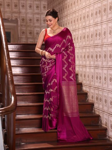 KAVVYA  WINE CREPE SAREE WITH ALL OVER GOLDEN ZARI WEAVING COMES WITH SATIN BORDER AND BEAUTIFUL ZARI WEAVED BLOUSE