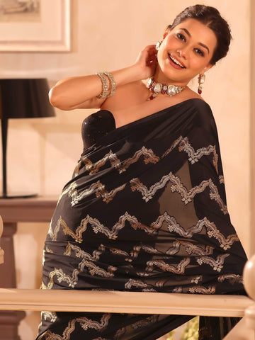 KAVVYA  BLACK CRAPE SAREE WITH ALL OVER GOLDEN ZARI
