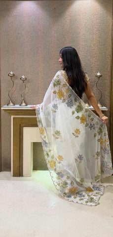 Elegant white organza saree with floral sequence work