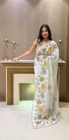 Elegant white organza saree with floral sequence work