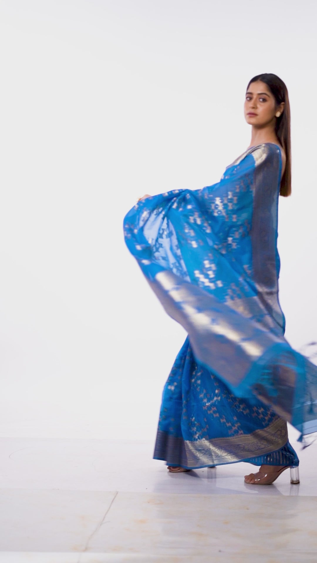 Kavvya Firozi Blue Soft & Lightweight Kora Organza Weaving Silk Saree In Golden Zari & Sequence Weaving On Body